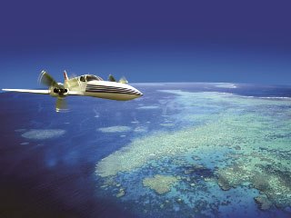 Jetstar flying over the Great Barrier Reef